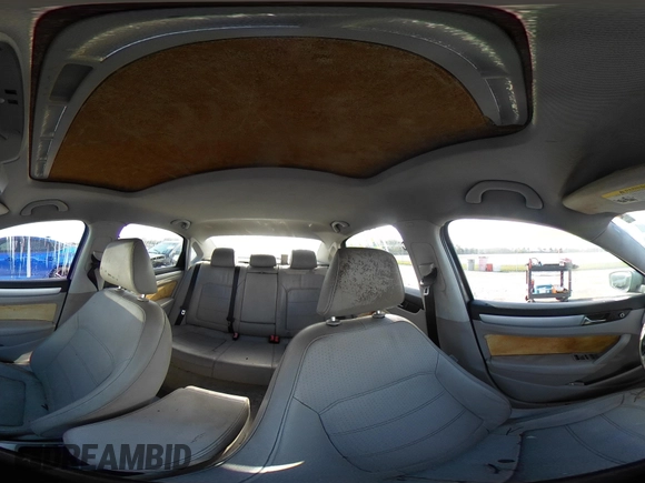2013 Volkswagen Passat SE w/Sunroof & Nav with VIN 1VWBP7A35DC038217, listed as a IAAI auction lot 41944193 with 102,767 mi miles. Bid and sale history available at carsss.com. Image 18.