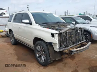 2015 Chevrolet Tahoe LTZ z VIN 1GNSKCKC2FR651895, wystawiony jako IAAI lot #42014545 z przebiegiem 133 689 mil mil oraz . Historia ofert i sprzedaży dostępna na DreamBid. Obrazek 1.
