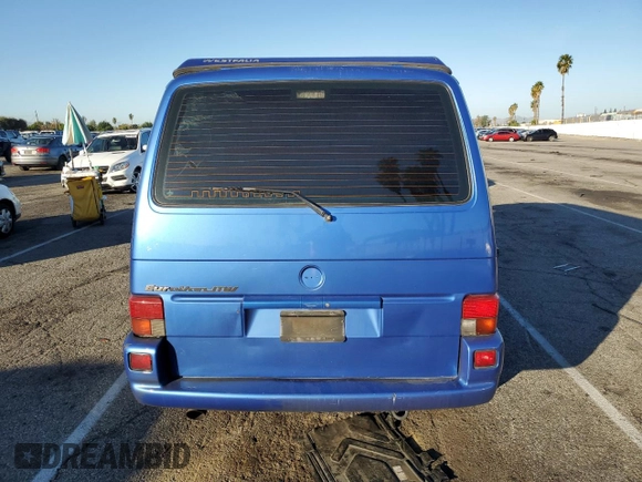 2001 Volkswagen EuroVan MV с VIN WV2NB47061H099148, выставлен на аукционе Copart как лот 77123813 с пробегом Не указан миль и На запчасти • Non repairable. История ставок и продаж доступна на DreamBid. Изображение 6.