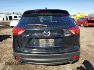2014 Mazda CX-5 Touring with VIN JM3KE2CY8E0356881, listed as a Copart auction lot 53051005 with 271,257 mi miles and Clean Title. Bid and sale history available at carsss.com. Image 6.