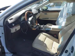 2016 Lexus ES 300h Hybrid with VIN JTHBW1GG0G2101603, listed as a IAAI auction lot 41677725 with 148,182 mi miles. Bid and sale history available at carsss.com. Image 5.