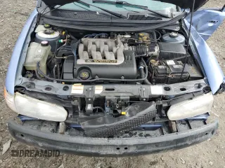1995 Ford Contour z VIN 1FALP65L7SK244644, wystawiony jako Copart lot #51668445 z przebiegiem 100 085 mil mil oraz Szkody całkowita. Historia ofert i sprzedaży dostępna na DreamBid. Obrazek 11.