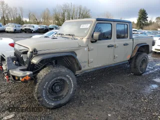 2020 Jeep Gladiator Overland z VIN 1C6HJTFG8LL147702, wystawiony jako Copart lot #48613135 z przebiegiem 159 558 mil mil oraz Czysty tytuł • Clean title. Historia ofert i sprzedaży dostępna na DreamBid. Obrazek 1.