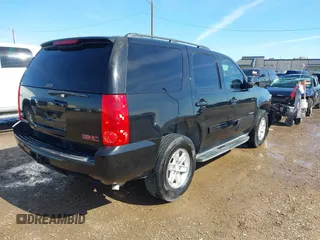 2011 GMC Yukon SLE with VIN 1GKS1AE01BR108215, listed as a IAAI auction lot 41379402 with 195,171 mi miles. Bid and sale history available at carsss.com. Image 4.
