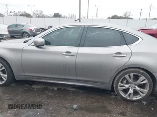 2013 Infiniti M37 with VIN JN1BY1AP7DM511497, listed as a IAAI auction lot 41294499 with 174,977 mi miles. Bid and sale history available at carsss.com. Image 14.