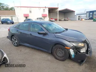 2019 Honda Civic Sedan LX with VIN 19XFC2F60KE018100, listed as a IAAI auction lot 41908486 with 124,357 mi miles. Bid and sale history available at carsss.com. Image 13.
