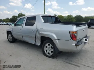 2006 Honda Ridgeline RTL with VIN 2HJYK16516H562690, listed as a Copart auction lot 66073094 with 211,924 mi miles and Salvage Title. Bid and sale history available at carsss.com. Image 2.