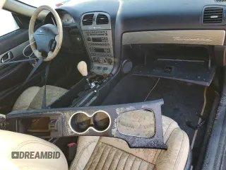 2004 Ford Thunderbird Deluxe with VIN 1FAHP60A14Y111339, listed as a Copart auction lot 77588194 with Not Provided miles and Salvage Title. Bid and sale history available at DreamBid. Image 8.