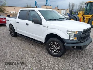 2016 Ford F-150 XLT with VIN 1FTEW1E84GKE18228, listed as a IAAI auction lot 41883297 with 147,018 mi miles. Bid and sale history available at carsss.com. Image 1.