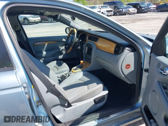 2004 Jaguar X-Type with VIN SAJEA51C64WD99643, listed as a IAAI auction lot 42086360 with 134,126 mi miles and . Bid and sale history available at DreamBid. Image 5.