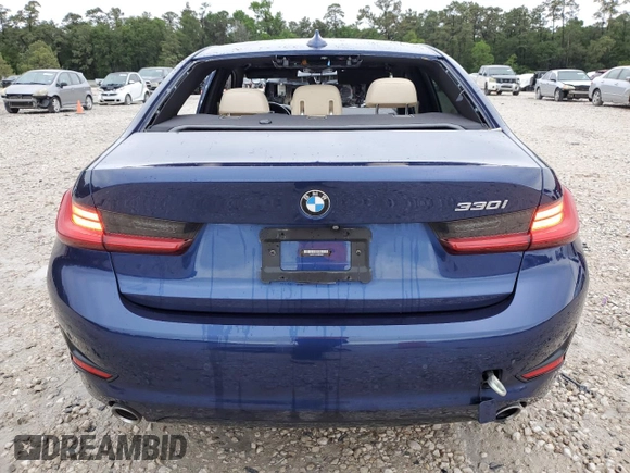 2020 BMW 3 Series 330i with VIN 3MW5R1J04L8B43542, listed as a Copart auction lot 52710145 with 58,597 mi miles and Clean title. Bid and sale history available at DreamBid. Image 6.
