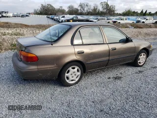 2000 Chevrolet Prizm z VIN 1Y1SK5280YZ405636, wystawiony jako Copart lot #41633235 z przebiegiem Nie podano mil oraz Nie do naprawy • Non repairable. Historia ofert i sprzedaży dostępna na DreamBid. Obrazek 3.