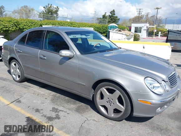 2003 Mercedes-Benz E-Class 3.2L with VIN WDBUF65J63X103423, listed as a IAAI auction lot 41937358 with 151,439 mi miles. Bid and sale history available at carsss.com. Image 1.