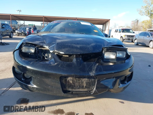 2002 Pontiac Firebird Firebird z VIN 2G2FS22K022109417, wystawiony jako IAAI lot #41199057 z przebiegiem 124 463 mil mil oraz . Historia ofert i sprzedaży dostępna na DreamBid. Obrazek 12.