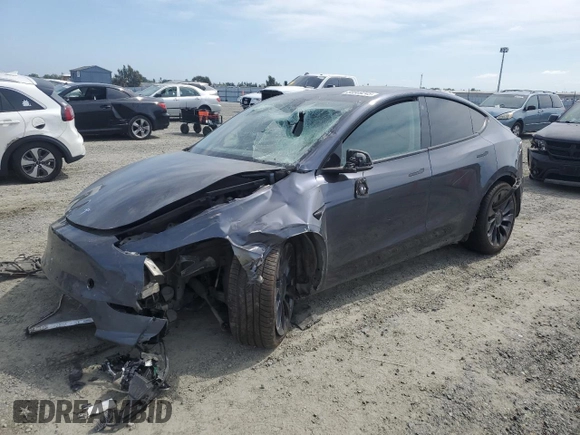 2021 Tesla Model Y Performance with VIN 5YJYGDEF2MF262273, listed as a Copart auction lot 50569245 with 90,879 mi miles and Salvage Title. Bid and sale history available at DreamBid. Image 1.