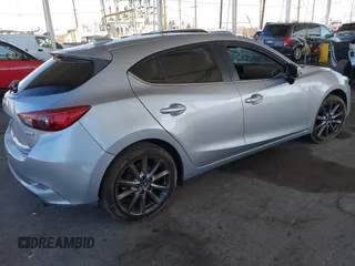 2018 Mazda 3 Touring with VIN 3MZBN1L31JM163466, listed as a IAAI auction lot 40777124 with 101,497 mi miles and . Bid and sale history available at carsss.com. Image 4.