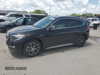 2022 BMW X1 xDrive28i z VIN WBXJG9C07N5U56591, wystawiony jako Copart lot #59965235 z przebiegiem 103 759 mil mil oraz Czysty tytuł • Clean title. Historia ofert i sprzedaży dostępna na DreamBid. Obrazek 1.