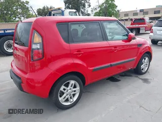 2011 Kia Soul + with VIN KNDJT2A23B7236403, listed as a IAAI auction lot 42100271 with 75,349 mi miles. Bid and sale history available at carsss.com. Image 4.