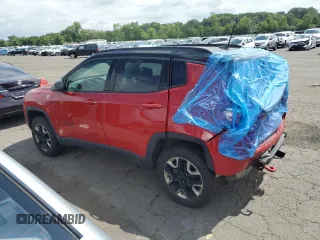 2017 Jeep Compass Trailhawk with VIN 3C4NJDDB7HT657463, listed as a Copart auction lot 60650765 with 100,979 mi miles and Salvage title. Bid and sale history available at DreamBid. Image 2.