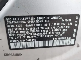 2012 Volkswagen Passat SEL with VIN 1VWCP7A34CC079912, listed as a IAAI auction lot 41993331 with 114,110 mi miles. Bid and sale history available at carsss.com. Image 9.