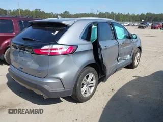 2020 Ford Edge SEL with VIN 2FMPK3J92LBA74106, listed as a IAAI auction lot 42157636 with 92,305 mi miles and . Bid and sale history available at DreamBid. Image 4.