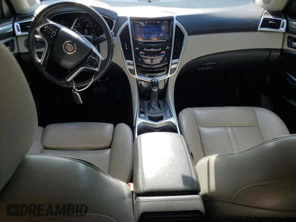 2016 Cadillac SRX Performance Collection z VIN 3GYFNCE30GS572828, wystawiony jako Copart lot #55176485 z przebiegiem 108 767 mil mil oraz Szkoda całkowita • Salvage title. Historia ofert i sprzedaży dostępna na DreamBid. Obrazek 8.