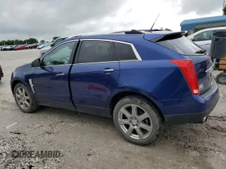 2012 Cadillac SRX Performance Collection with VIN 3GYFNBE35CS579214, listed as a Copart auction lot 54725465 with 114,829 mi miles and Salvage title. Bid and sale history available at DreamBid. Image 2.