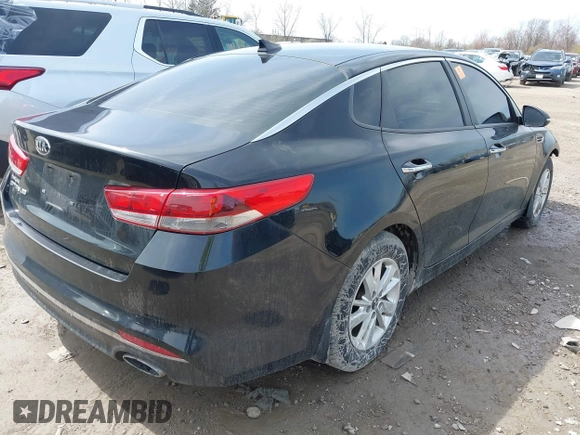 2016 Kia Optima LX with VIN KNAGT4L34G5110742, listed as a IAAI auction lot 41931969 with 128,458 mi miles. Bid and sale history available at carsss.com. Image 4.