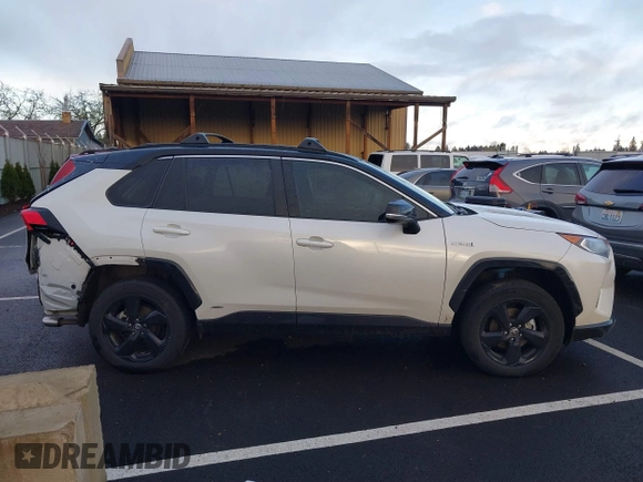 2021 Toyota RAV4 Hybrid XSE with VIN 4T3E6RFV8MU056524, listed as a IAAI auction lot 41788452 with 56,751 mi miles. Bid and sale history available at carsss.com. Image 14.