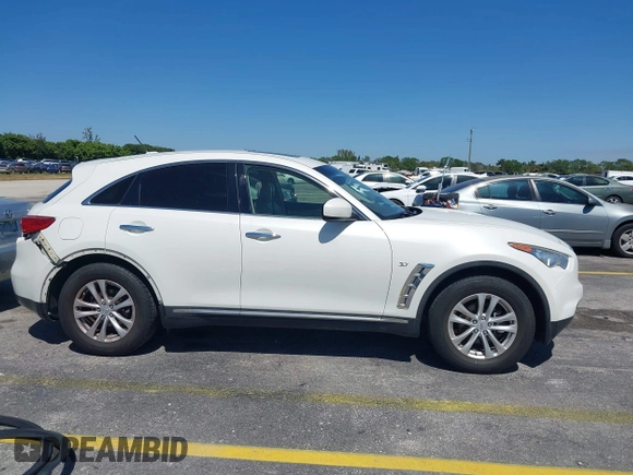 2017 Infiniti QX70 z VIN JN8CS1MU4HM142385, wystawiony jako IAAI lot #41774588 z przebiegiem 80 015 mil mil oraz . Historia ofert i sprzedaży dostępna na DreamBid. Obrazek 14.
