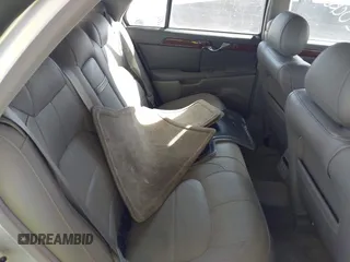 2003 Cadillac DeVille DTS z VIN 1G6KF57923U260229, wystawiony jako IAAI lot #41415468 z przebiegiem 58 012 mil mil oraz . Historia ofert i sprzedaży dostępna na DreamBid. Obrazek 8.