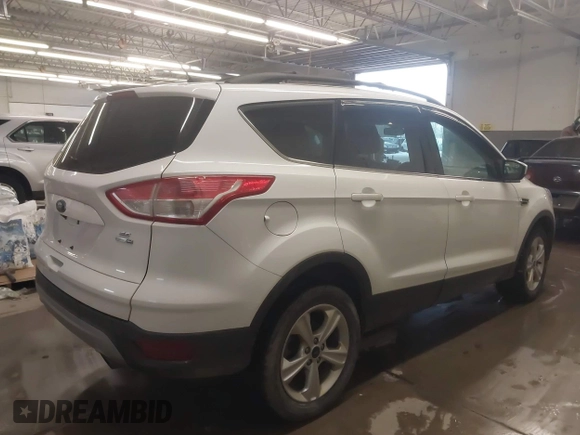 2016 Ford Escape SE with VIN 1FMCU9GX6GUB65266, listed as a IAAI auction lot 41559663 with 55,883 mi miles and . Bid and sale history available at DreamBid. Image 4.