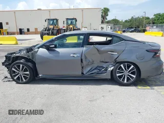 2021 Nissan Maxima SV z VIN 1N4AA6CVXMC508952, wystawiony jako IAAI lot #42491745 z przebiegiem 66 250 mil mil oraz . Historia ofert i sprzedaży dostępna na DreamBid. Obrazek 14.