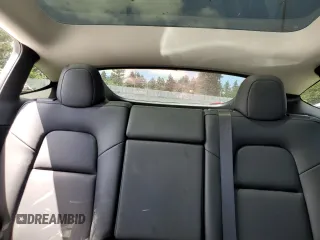 2024 Tesla Model Y с VIN 7SAYGDED1RF053003, выставлен на аукционе Copart как лот 63120195 с пробегом 8 679 миль миль и Списание • Salvage title. История ставок и продаж доступна на DreamBid. Изображение 10.