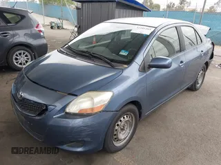 2009 Toyota Yaris with VIN JTDBT903791302911, listed as a IAAI auction lot 42181264 with 183,321 mi miles. Bid and sale history available at carsss.com. Image 2.