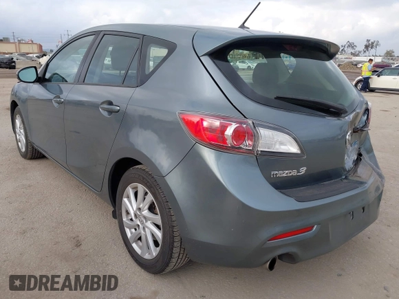 2012 Mazda Mazda3 i Touring with VIN JM1BL1L84C1671872, listed as a IAAI auction lot 42116842 with 85,343 mi miles. Bid and sale history available at carsss.com. Image 3.