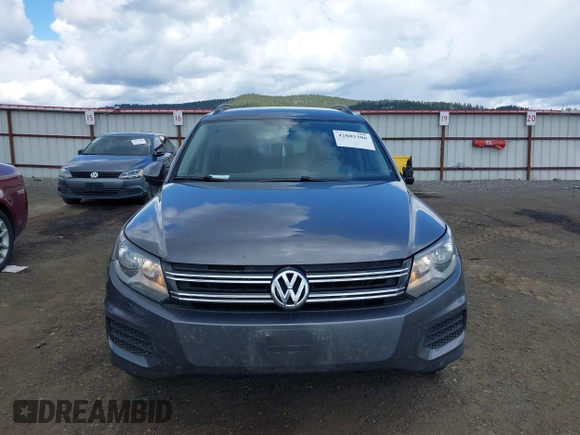 2016 Volkswagen Tiguan S with VIN WVGBV7AX6GW607716, listed as a IAAI auction lot 42085386 with 154,348 mi miles and . Bid and sale history available at DreamBid. Image 13.