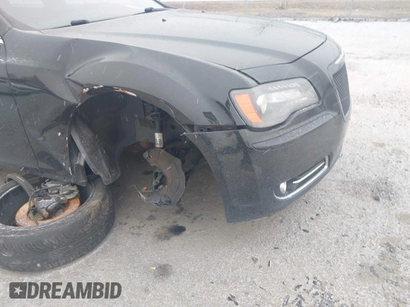 2013 Chrysler 300 with VIN 2C3CCABT7DH652797, listed as a IAAI auction lot 41602405 with 203,920 mi miles. Bid and sale history available at carsss.com. Image 6.