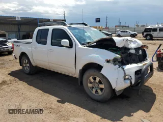 2011 Nissan Frontier Pro-4X with VIN 1N6AD0EV5BC406965, listed as a Copart auction lot 59335675 with 168,296 mi miles and Salvage title. Bid and sale history available at DreamBid. Image 4.