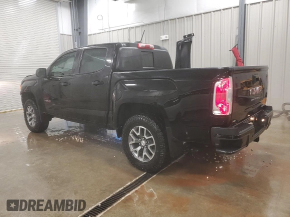 2021 GMC Canyon 4WD AT4 w/Cloth with VIN 1GTG6FEN0M1106579, listed as a Copart auction lot 81330184 with 29,630 mi miles and Salvage Title. Bid and sale history available at carsss.com. Image 2.