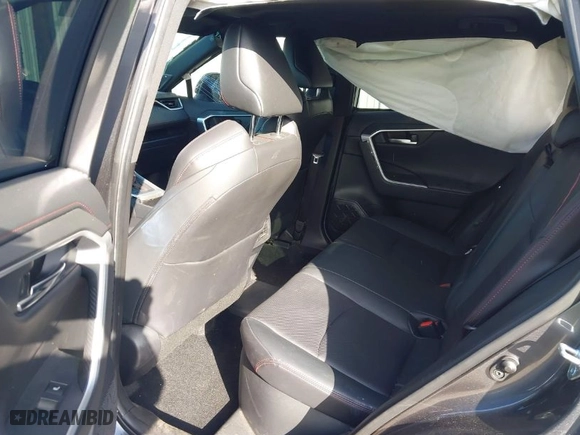 2021 Toyota RAV4 Prime XSE with VIN JTMFB3FV7MD009740, listed as a IAAI auction lot 41666510 with 59,950 mi miles. Bid and sale history available at carsss.com. Image 8.