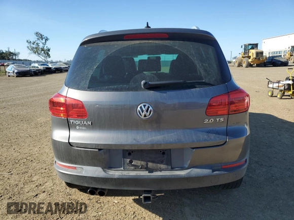 2014 Volkswagen Tiguan SEL with VIN WVGAV3AX0EW555873, listed as a Copart auction lot 55695955 with 69,984 mi miles and Salvage title. Bid and sale history available at DreamBid. Image 6.