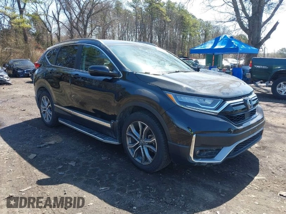 2020 Honda CR-V Touring with VIN 2HKRW2H98LH660573, listed as a IAAI auction lot 41524610 with 37,493 mi miles and . Bid and sale history available at DreamBid. Image 1.