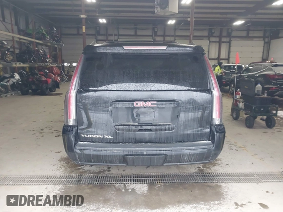 2015 GMC Yukon XL SLT with VIN 1GKS2HKC9FR175011, listed as a IAAI auction lot 41510519 with 194,136 mi miles. Bid and sale history available at carsss.com. Image 16.