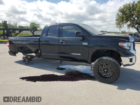 2021 Toyota Tundra 2WD SR with VIN 5TFRY5F17MX293728, listed as a Copart auction lot 71919534 with 65,989 mi miles and Salvage Title. Bid and sale history available at carsss.com. Image 4.