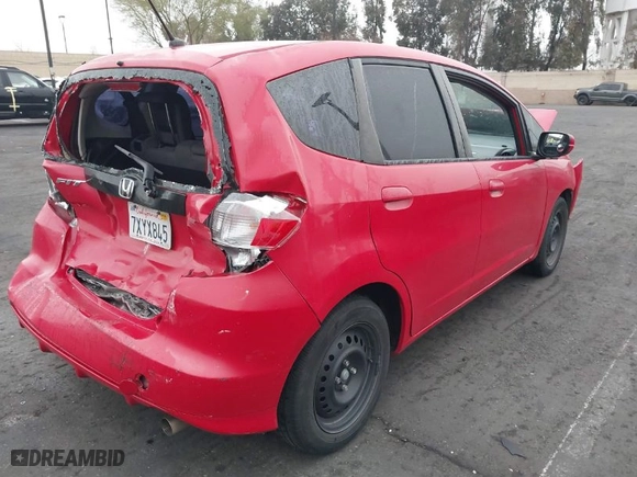 2013 Honda Fit with VIN JHMGE8H3XDC034737, listed as a IAAI auction lot 41865531 with 91,747 mi miles. Bid and sale history available at carsss.com. Image 4.