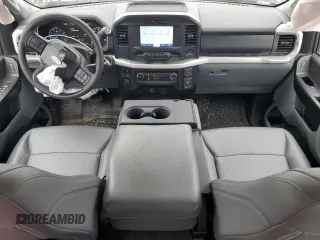 2021 Ford F-150 XL with VIN 1FTEX1CB5MKE66151, listed as a Copart auction lot 50883995 with 55,607 mi miles and Salvage title. Bid and sale history available at DreamBid. Image 8.