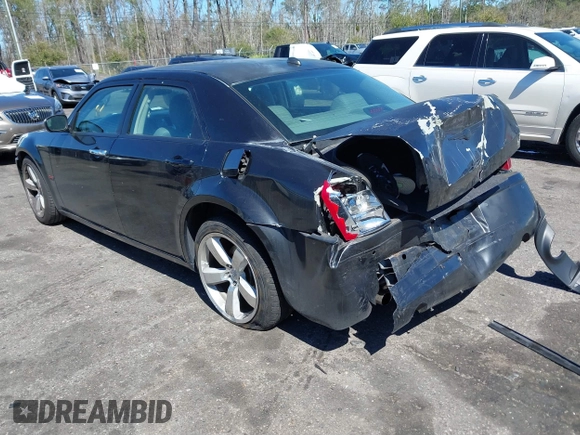 2005 Chrysler 300 with VIN 2C3AA63HX5H649107, listed as a IAAI auction lot 41748562 with 173,803 mi miles. Bid and sale history available at carsss.com. Image 3.