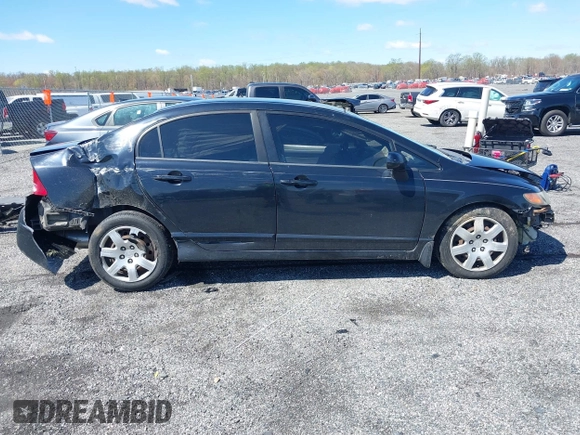 2007 Honda Civic Sdn LX with VIN 1HGFA16577L134935, listed as a IAAI auction lot 41975087 with 255,338 mi miles. Bid and sale history available at carsss.com. Image 14.