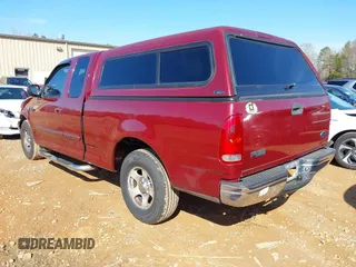 2003 Ford F-150 XL with VIN 1FTRX17W43NA07186, listed as a IAAI auction lot 41864354 with 123,565 mi miles. Bid and sale history available at carsss.com. Image 3.